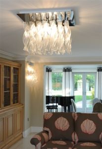 Glass ceiling light in lounge
