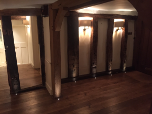 Floor & wall lighting on wood pillars and wall