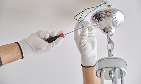 Home Lighting Installation Management - Electrician Wiring a Light 